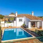 Very attractive detached split level 2 bedroom villa with pool & sea view. Moncarapacho. 2