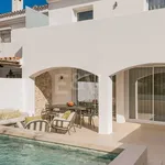 Ibicenco-Style Beachside Townhouse with Private Heated Pool and Indoor-Outdoor Living 1