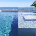 An Exceptional Duplex Penthouse with Sweeping Views Moments from the Beach 1