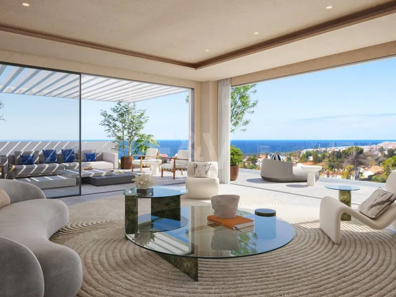 An Exceptional Duplex Penthouse with Sweeping Views Moments from the Beach