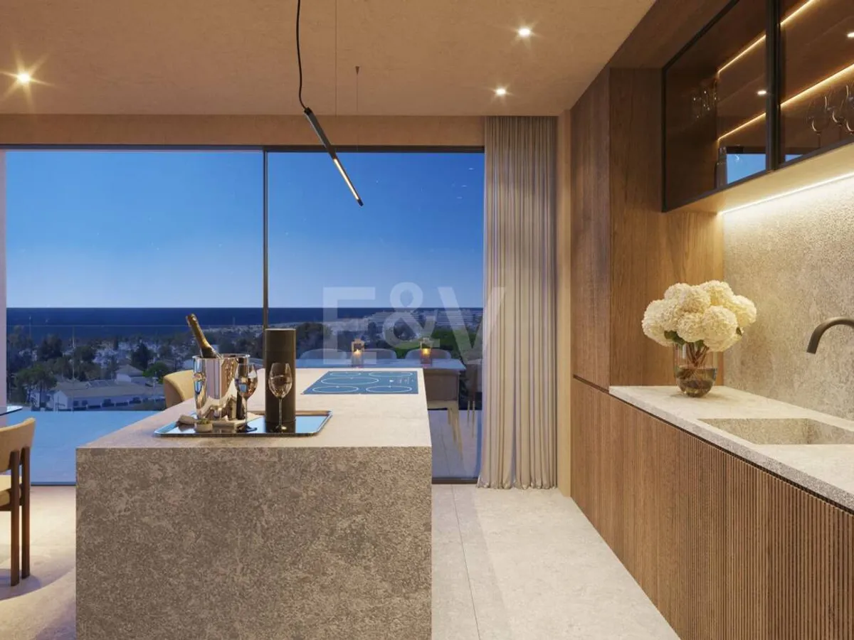 An Exceptional Duplex Penthouse with Sweeping Views Moments from the Beach