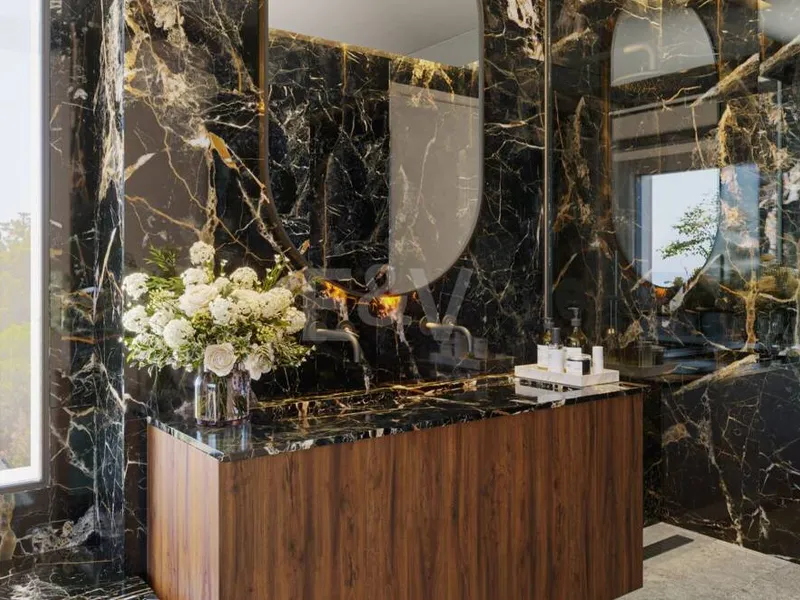 An Exceptional Duplex Penthouse with Sweeping Views Moments from the Beach