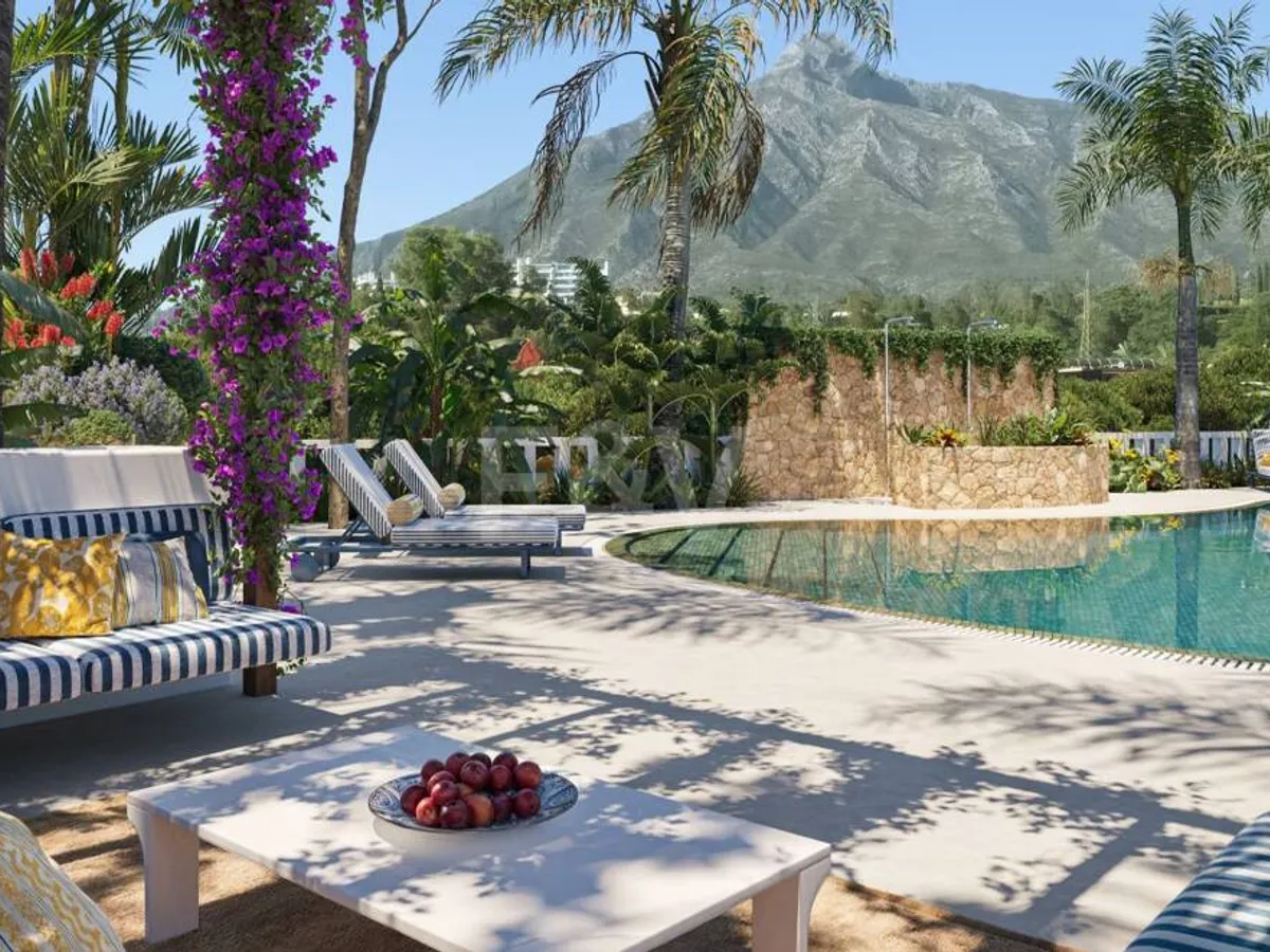 An Exceptional Duplex Penthouse with Sweeping Views Moments from the Beach