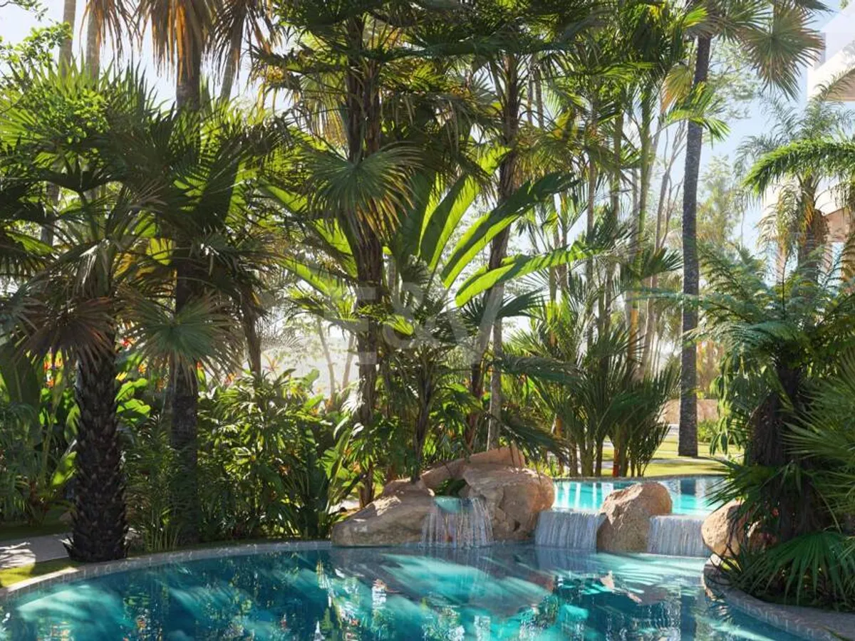 An Exceptional Duplex Penthouse with Sweeping Views Moments from the Beach