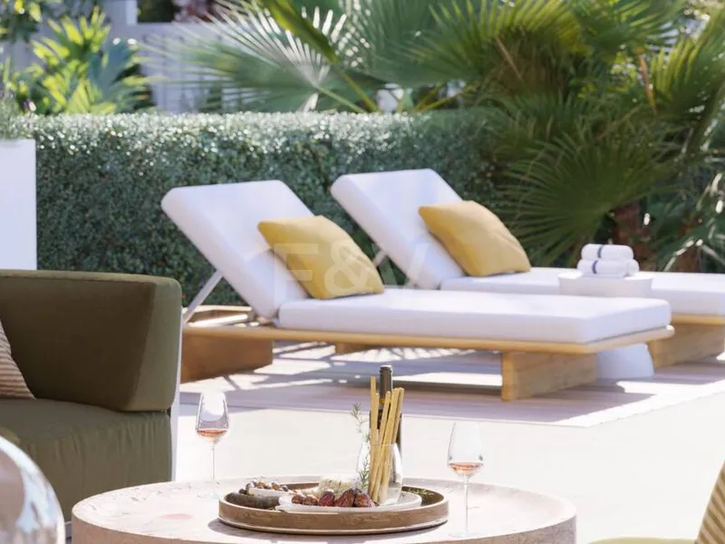 An Exceptional Duplex Penthouse with Sweeping Views Moments from the Beach