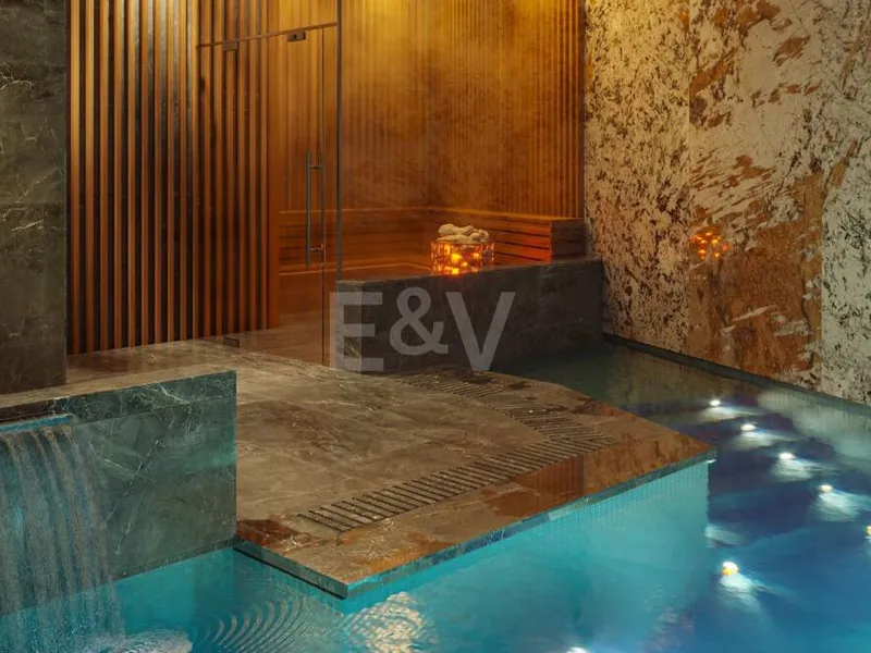 An Exceptional Duplex Penthouse with Sweeping Views Moments from the Beach