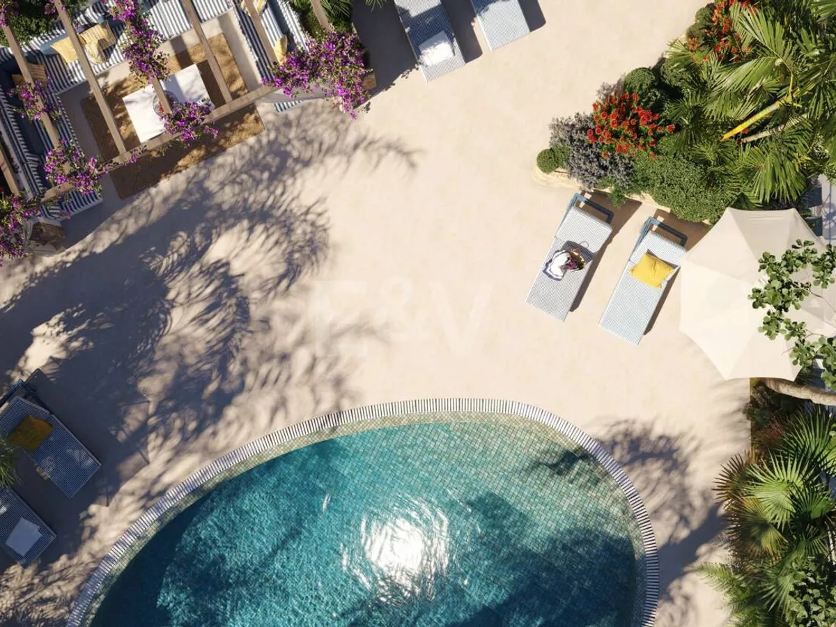 An Exceptional Duplex Penthouse with Sweeping Views Moments from the Beach