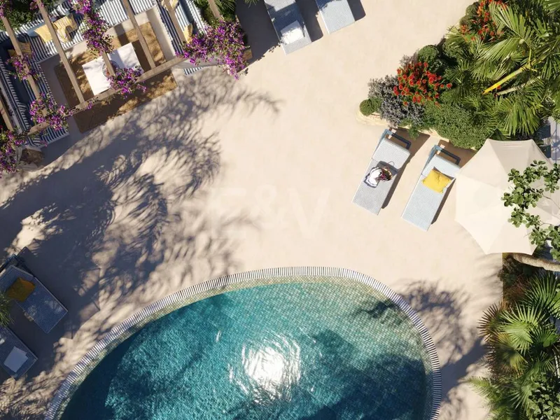 An Exceptional Duplex Penthouse with Sweeping Views Moments from the Beach