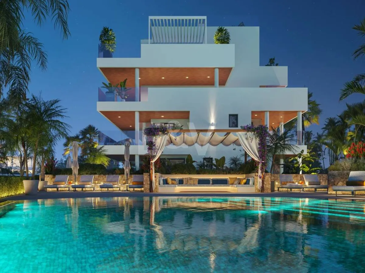 An Exceptional Duplex Penthouse with Sweeping Views Moments from the Beach