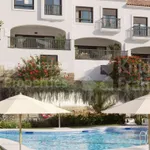 Estepona West, Renovated townhouse in a frontline golf setting in western Estepona 1