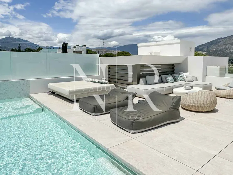 Newly built semi-detached villa in Nueva Andalucia with panoramic sea views for sale