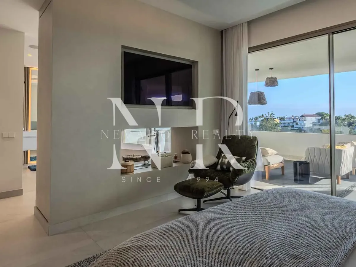 Newly built semi-detached villa in Nueva Andalucia with panoramic sea views for sale