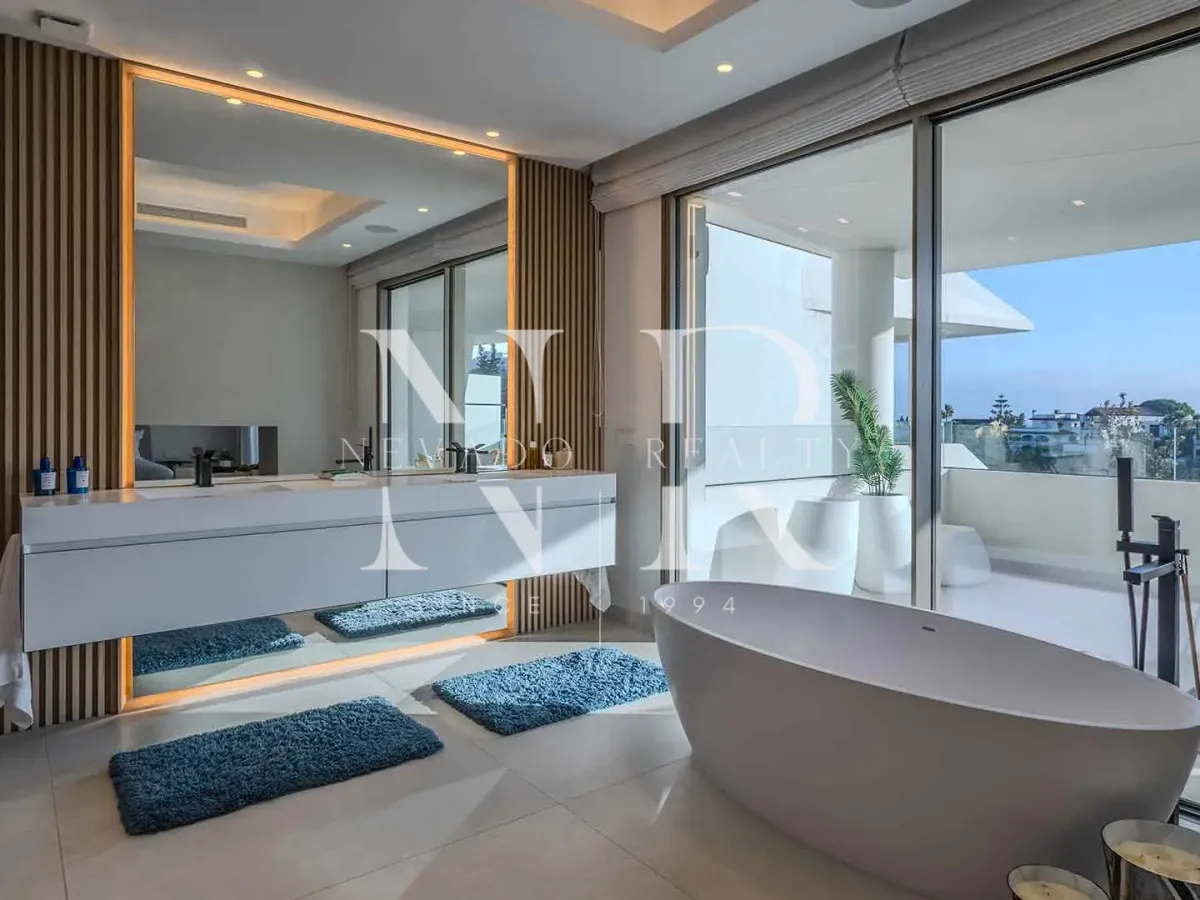 Newly built semi-detached villa in Nueva Andalucia with panoramic sea views for sale