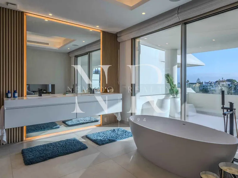 Newly built semi-detached villa in Nueva Andalucia with panoramic sea views for sale