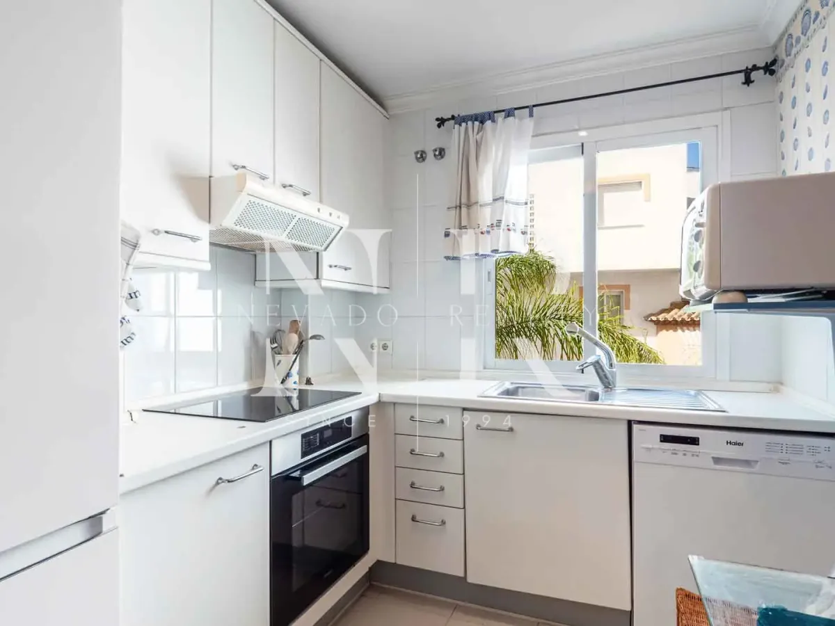 Frontline beach flat in La Herradura for sale