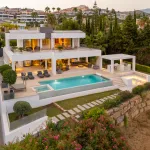 Frontline golf luxury villa for sale in Nueva Andalucia, Marbella with private gym 1