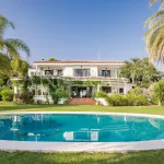Charming family villa with sea and mountain views, lush garden and serene poolside next to Marbella town 1