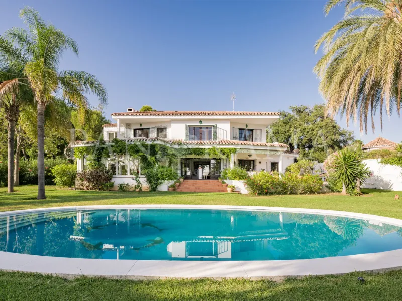 Charming family villa with sea and mountain views, lush garden and serene poolside next to Marbella town