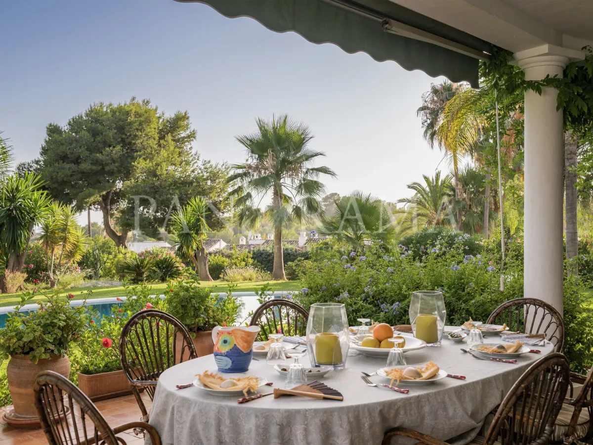 Charming family villa with sea and mountain views, lush garden and serene poolside next to Marbella town