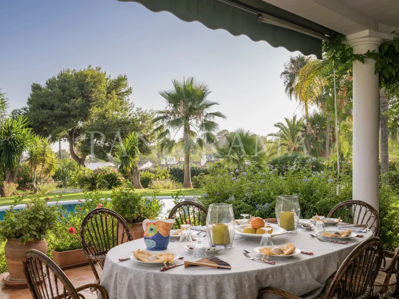 Charming family villa with sea and mountain views, lush garden and serene poolside next to Marbella town