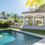 Modern and sleek villa in a gated community in Nueva Andalucía 1