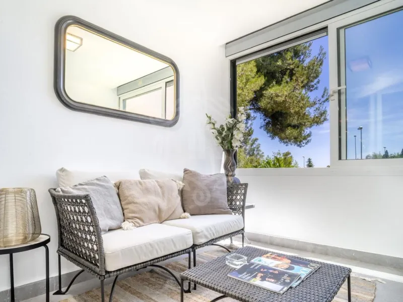 Spacious Three-Bedroom Apartment with Communal Amenities in Nueva Andalucia, Marbella