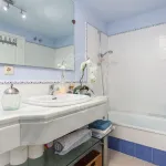 Elegant Two-Bedroom Apartment with Panoramic Golf Views in Guadalmina Alta 11