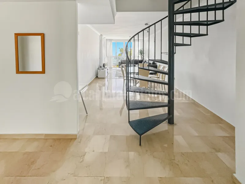 Fantastic, southwest-facing four-bedroom duplex penthouse, set in a prime position within the prestigious Puerto Banús, Marbella