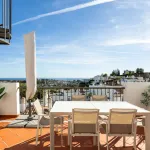 Elegant penthouse in Paraiso Pueblo featuring sea views, spacious terraces, and full facilities. 4