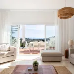 Elegant penthouse in Paraiso Pueblo featuring sea views, spacious terraces, and full facilities. 5