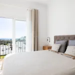 Elegant penthouse in Paraiso Pueblo featuring sea views, spacious terraces, and full facilities. 10