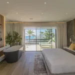 STUNNING 4 BEDROOM TOWNHOUSE LOCATED FRONT LINE BEACH IN MARBELLA 11