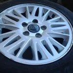 JUEGO LLANTAS VOLVO 15 CON GOMAS NUEVAS ORIGINALES 2
